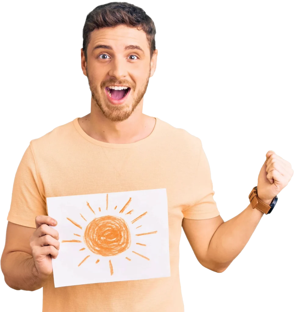 Man excitedly holding a sun drawing, wearing a peach shirt, celebrating creativity on a white background.