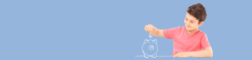 Child in pink shirt putting coin into drawn piggy bank on blue background, symbolizing savings and financial education.