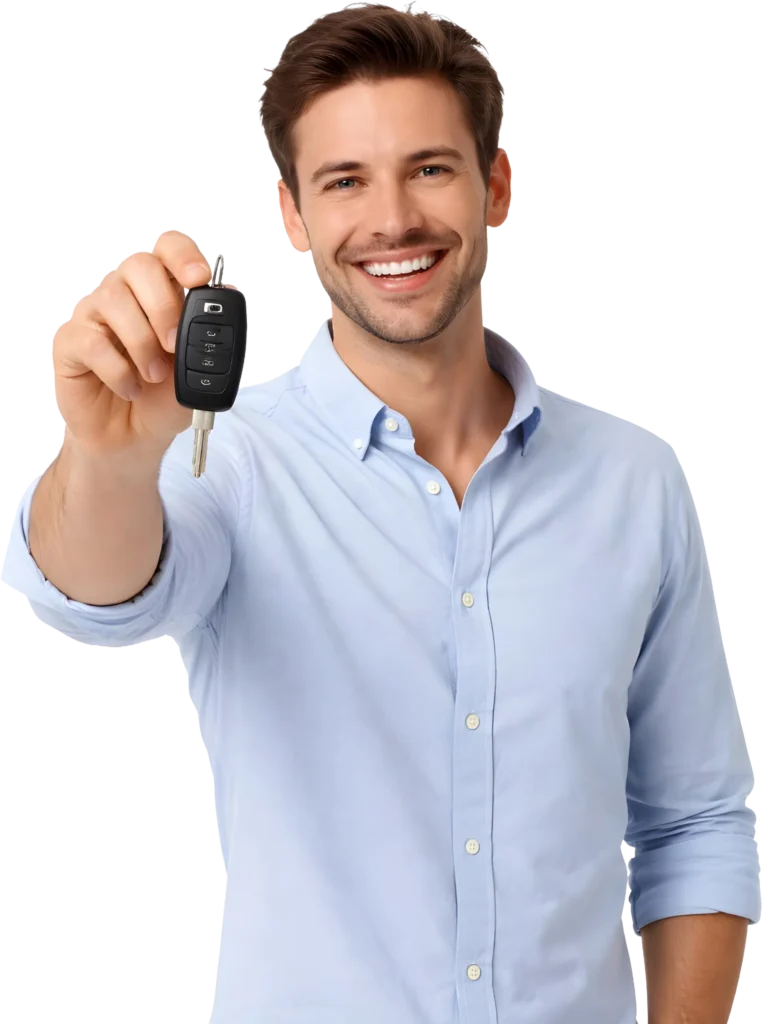 Smiling man holding a car key, indicating new car ownership or automotive sales opportunity.