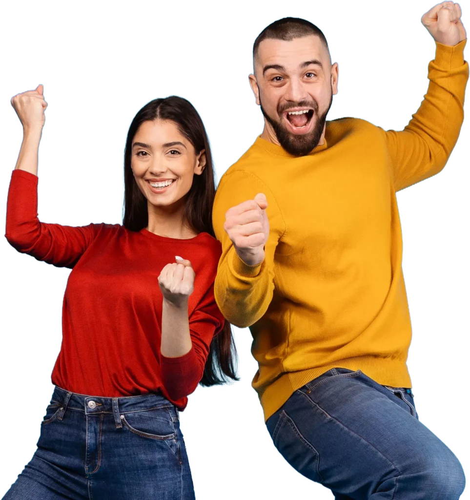 Two excited people in colorful sweaters celebrate with fists raised, expressing joy and success.